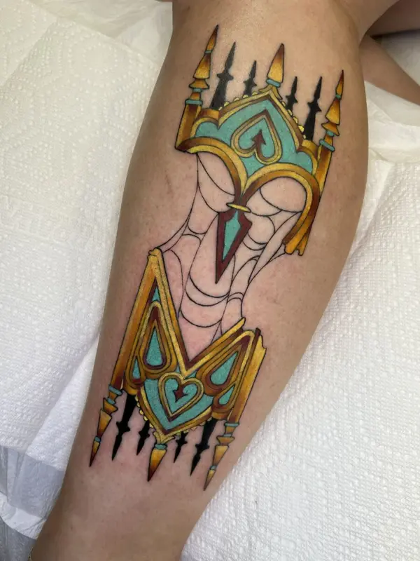 Full color jeweled ornamental tattoo, leg