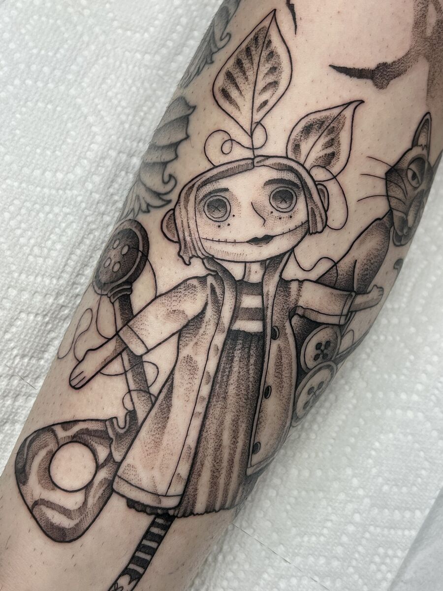 Coraline-inspired tattoo